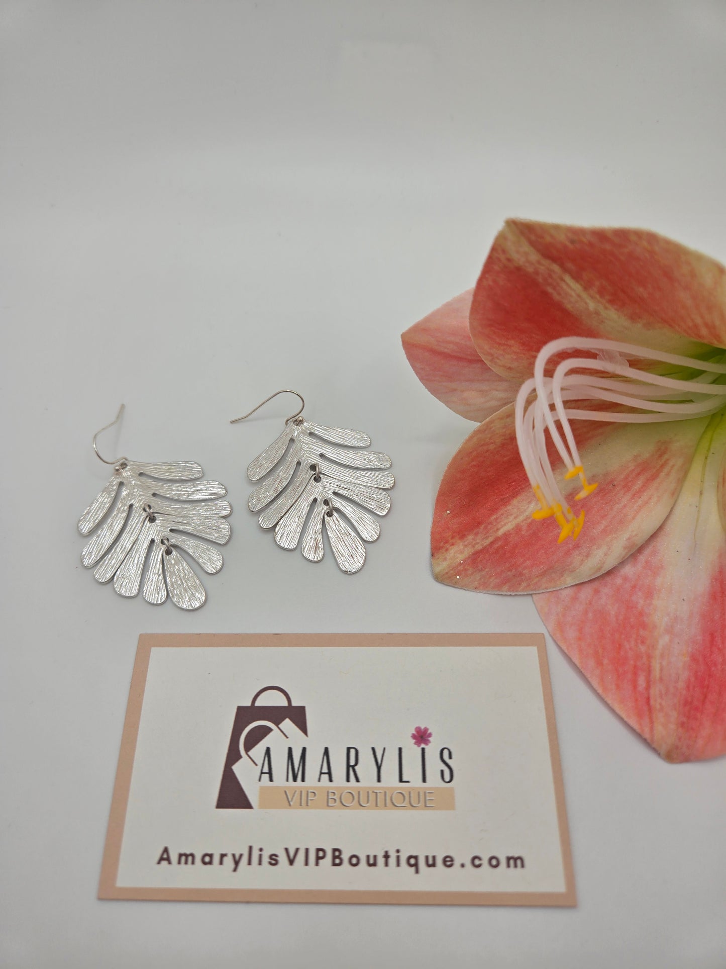 holiday sparkle, festive accessories, gift-worthy earrings, elegant holiday style, perfect Christmas gift, seasonal jewelry, timeless elegance, statement earrings, holiday outfit essentials, Christmas party style, special occasion earrings, stylish gift ideas, metallic leaf design, unique earrings, holiday glam