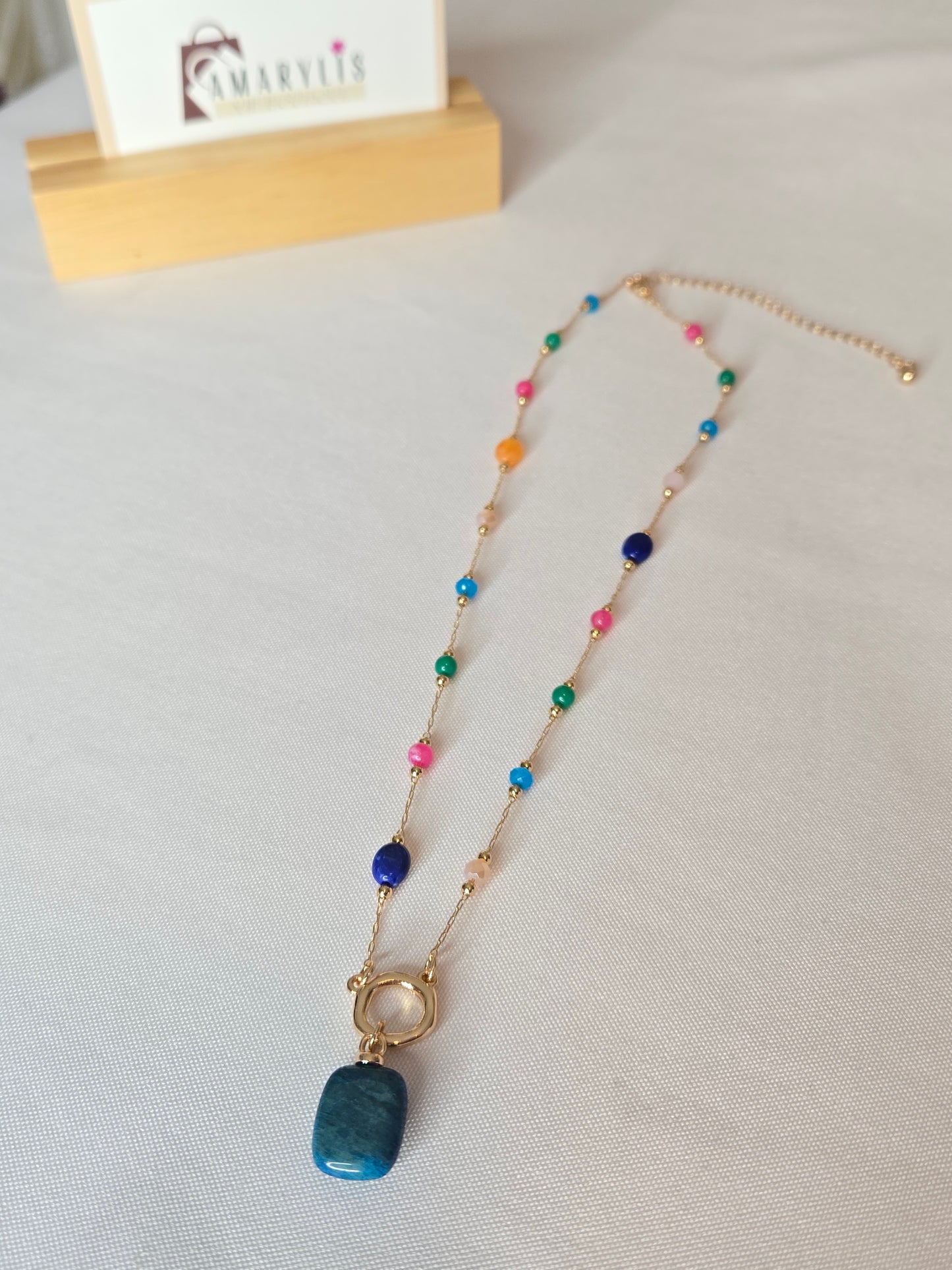 Multicolor gemstone pendant necklace featuring a delicate chain and an elegant pendant design, perfect for adding a sophisticated touch to everyday and special occasion looks.