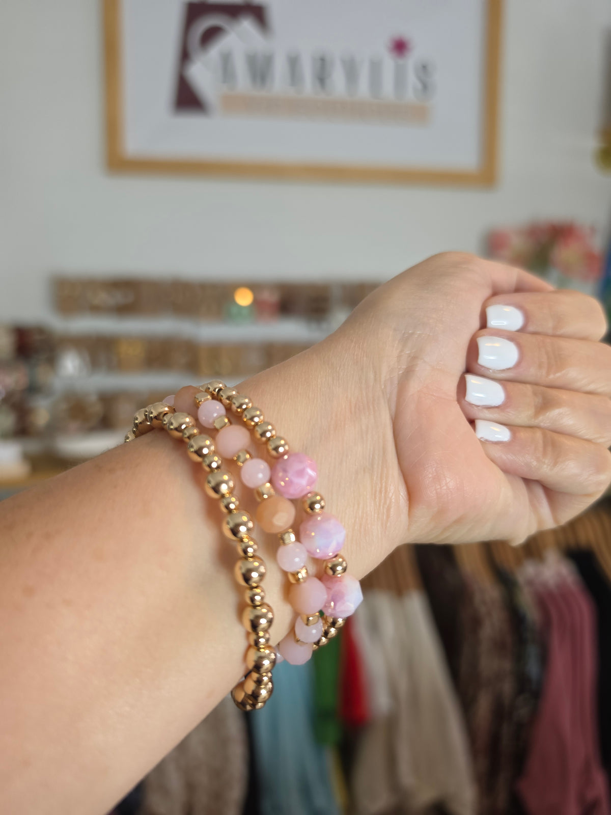 Set of pink faceted stone stretch bracelets with gold-tone beads