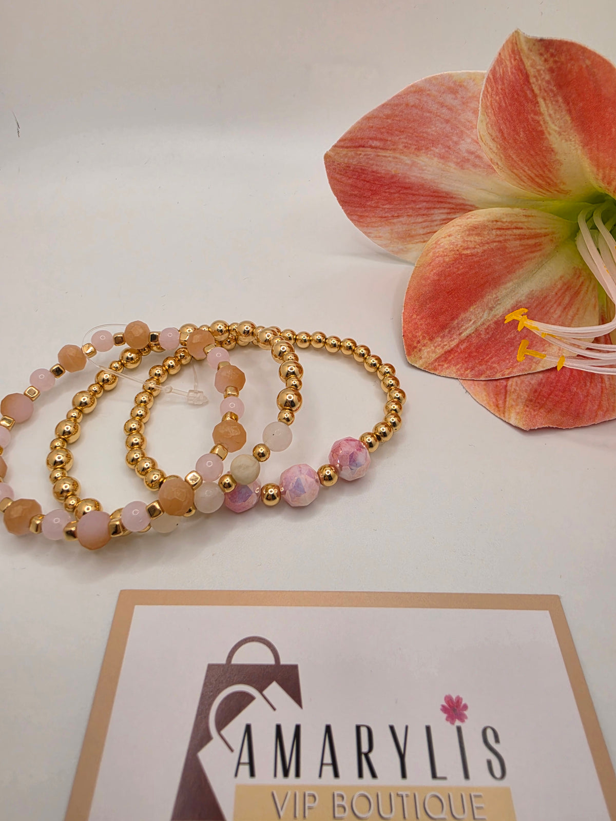 Set of pinkfaceted stone stretch bracelets with gold-tone beads