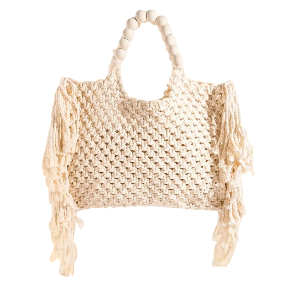 Large woven macrame tote bag with intricate knotted design, long fringe trim, and braided shoulder strap.