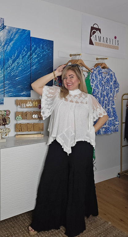 amarylisvipboutique, Boho pants, high-waisted trousers, flowy wide-leg pants, smocking detail pants, ruffle detail, feminine boho fashion, casual chic pants, summer wide-leg pants, boho style trousers, comfortable stylish pants
