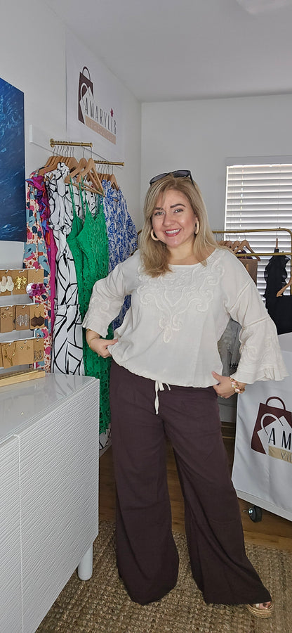 #HighWaistPants #ChicStyle #BohoElegance #ComfortAndStyle #WardrobeEssentials #TimelessFashion #EffortlessChic #TrendyLooks #SmockedWaist #SidePockets #ClassicVibes #amarylisvipboutique