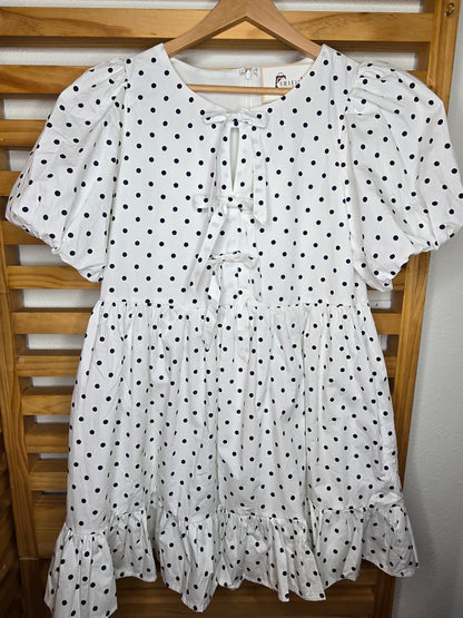 puff sleeve dress, polka dot dress, ruffle hem, front bow, lined dress, classic style, elegant outfit, feminine fashion, lightweight fabric, chic and timeless, amarylisvipboutique, boutiqueonline