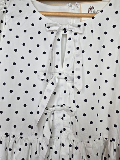 puff sleeve dress, polka dot dress, ruffle hem, front bow, lined dress, classic style, elegant outfit, feminine fashion, lightweight fabric, chic and timeless, amarylisvipboutique, boutiqueonline