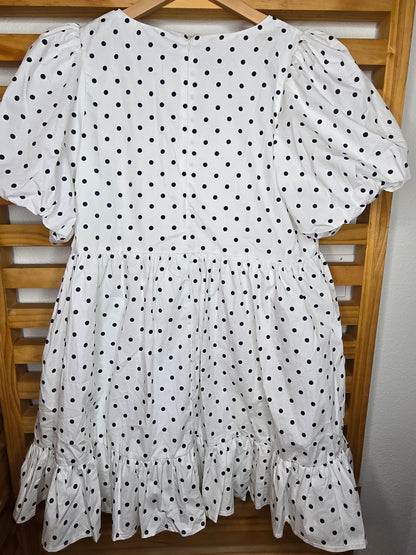 puff sleeve dress, polka dot dress, ruffle hem, front bow, lined dress, classic style, elegant outfit, feminine fashion, lightweight fabric, chic and timeless, amarylisvipboutique, boutiqueonline