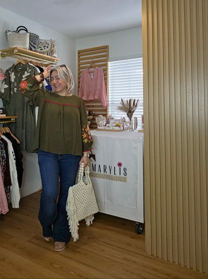 Women's boho blouse with embroidered sleeves and contrasting zigzag trim