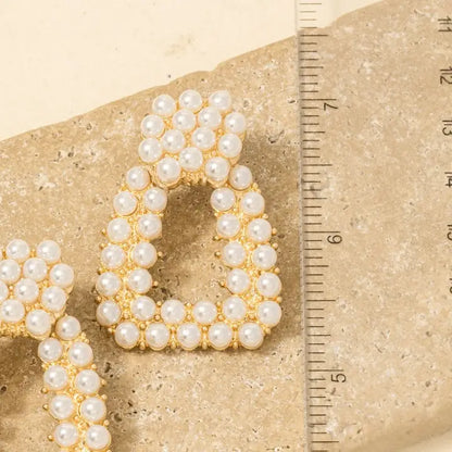 pearl earrings, statement jewelry, hoop earrings, elegant accessories, fashion earrings, versatile earrings, trendy jewelry