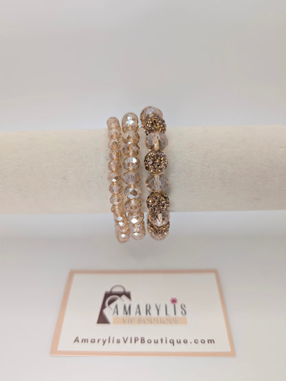 Set of beaded bracelets on a white background with Amarylis VIP Boutique logo.
