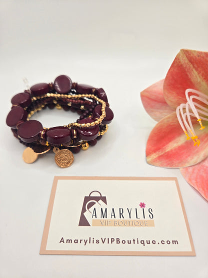 Bohemian-inspired set of 7 assorted abstract beaded bracelets.