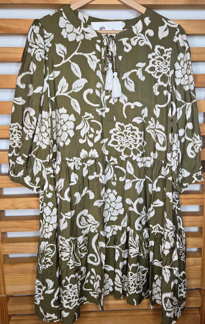 boho dress, floral dress, olive dress, white flowers, 3/4 sleeves, babydoll dress, loose fit, comfy dress, dress with pockets, tassel dress, feminine style, casual boho, relaxed look, soft fabric, everyday dress, amarylisvipboutique, amarylis