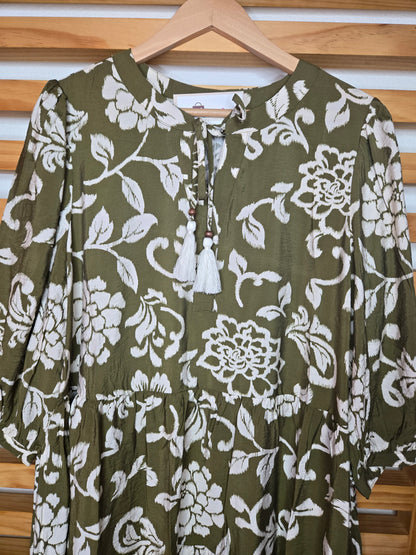 boho dress, floral dress, olive dress, white flowers, 3/4 sleeves, babydoll dress, loose fit, comfy dress, dress with pockets, tassel dress, feminine style, casual boho, relaxed look, soft fabric, everyday dress, amarylisvipboutique, amarylis