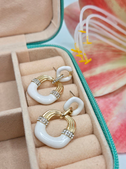 white and gold earrings, zirconia earrings, elegant earrings, sparkling earrings, fashion jewelry, statement earrings, women's accessories, sophisticated earrings, chic earrings, gold jewelry