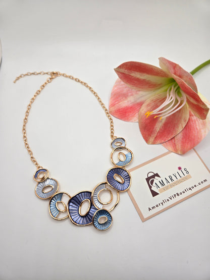 #GoldNecklace #GeometricJewelry #BlueTonedNecklace #StatementNecklace #ModernAccessories #ChicJewelry #FashionJewelry #ContemporaryStyle #GoldJewelry #ElegantAccessories #TrendyNecklace #BoldNecklace