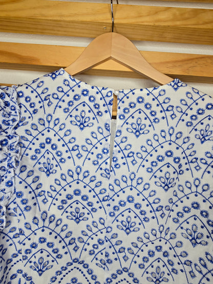 #BohoStyle #EmbroideredTop #EyeletBlouse #RuffleSleeves #ChicAndFeminine #ScallopedHem #BlueAndWhite #TimelessFashion #EffortlessStyle #BohoChic #eyelet #amarylisvipboutique