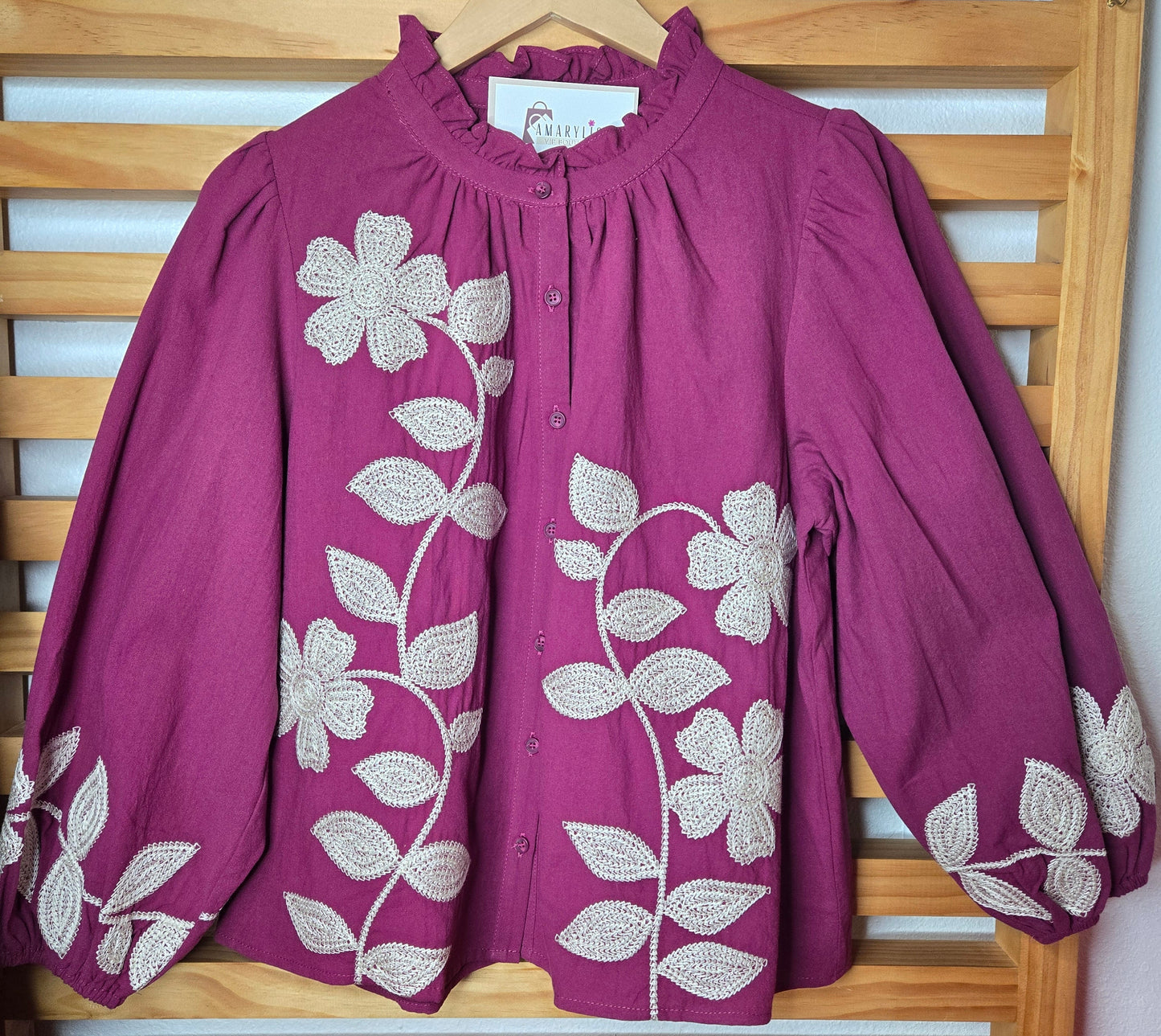 Floral embroidered magenta blouse with button-down front