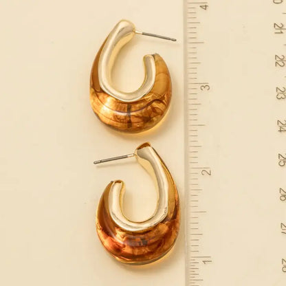 hoop earrings, resin jewelry, oval hoops, modern accessories, fashion earrings, statement hoops, boho chic