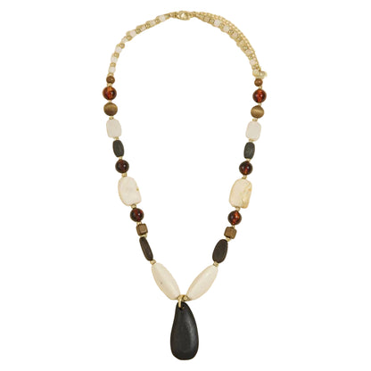 A timeless wood bead necklace with a graceful teardrop pendant, designed to bring natural beauty and effortless elegance to your wardrobe.