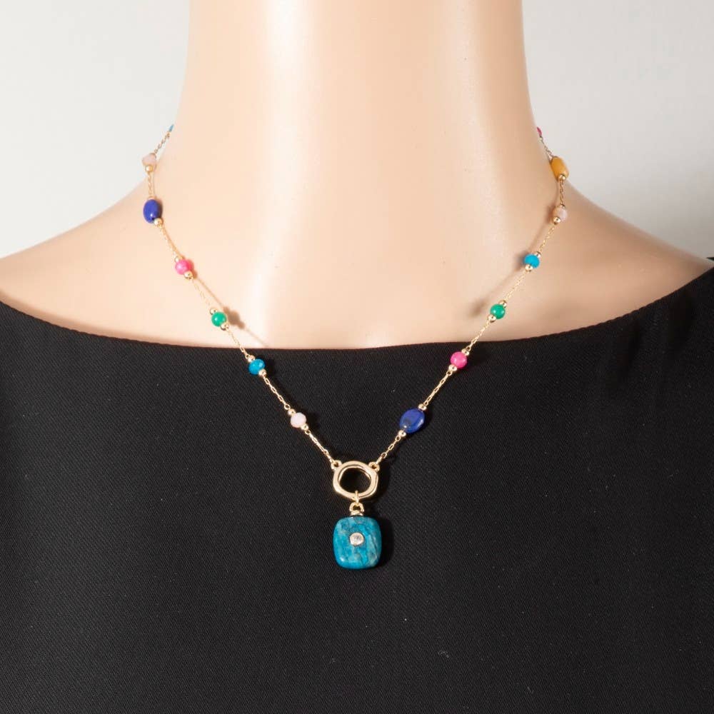Multicolor gemstone pendant necklace featuring a delicate chain and an elegant pendant design, perfect for adding a sophisticated touch to everyday and special occasion looks.