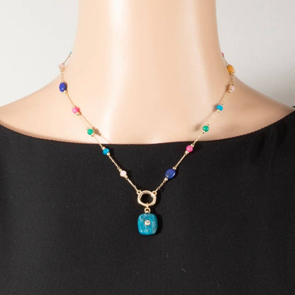 Multicolor gemstone pendant necklace featuring a delicate chain and an elegant pendant design, perfect for adding a sophisticated touch to everyday and special occasion looks.