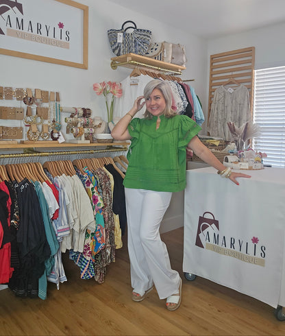 Designed with a flattering V-neckline, delicate lace accents, and soft short sleeves, this versatile piece combines comfort with timeless style. The lightweight fabric and relaxed silhouette make it easy to pair with jeans, shorts, skirts, or dress pants for both casual outings and polished everyday looks.