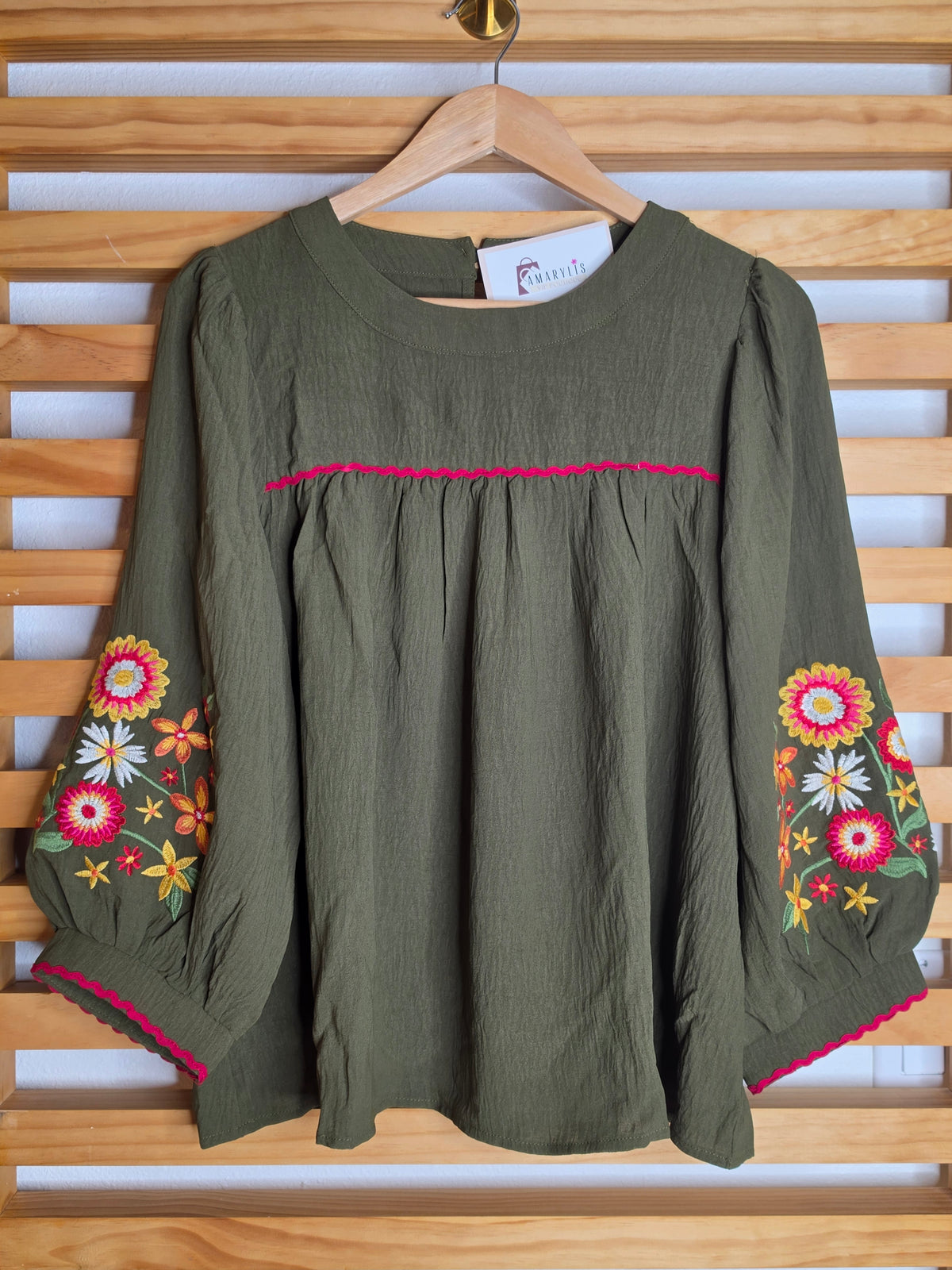 Women's boho blouse with embroidered sleeves and contrasting zigzag trim