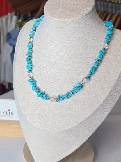 beautiful turquoise pebble stone beaded necklace. Designed to complement both everyday outfits and dressier ensembles, its timeless silhouette adds a subtle pop of color and natural elegance.
