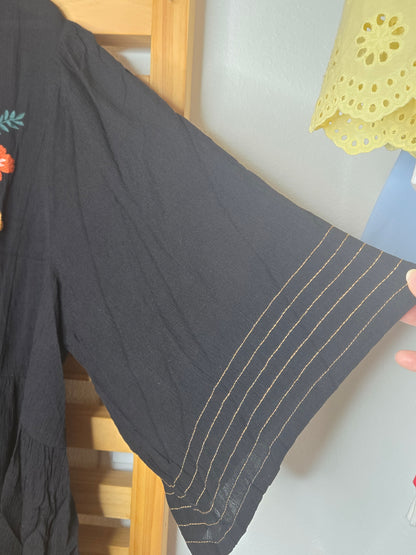 boho style blouse, black boho blouse, embroidered black blouse, tassel detail top, bohemian black top, lightweight boho blouse, half wing sleeve blouse, crinkle fabric blouse, floral embroidered top, boho chic outfit