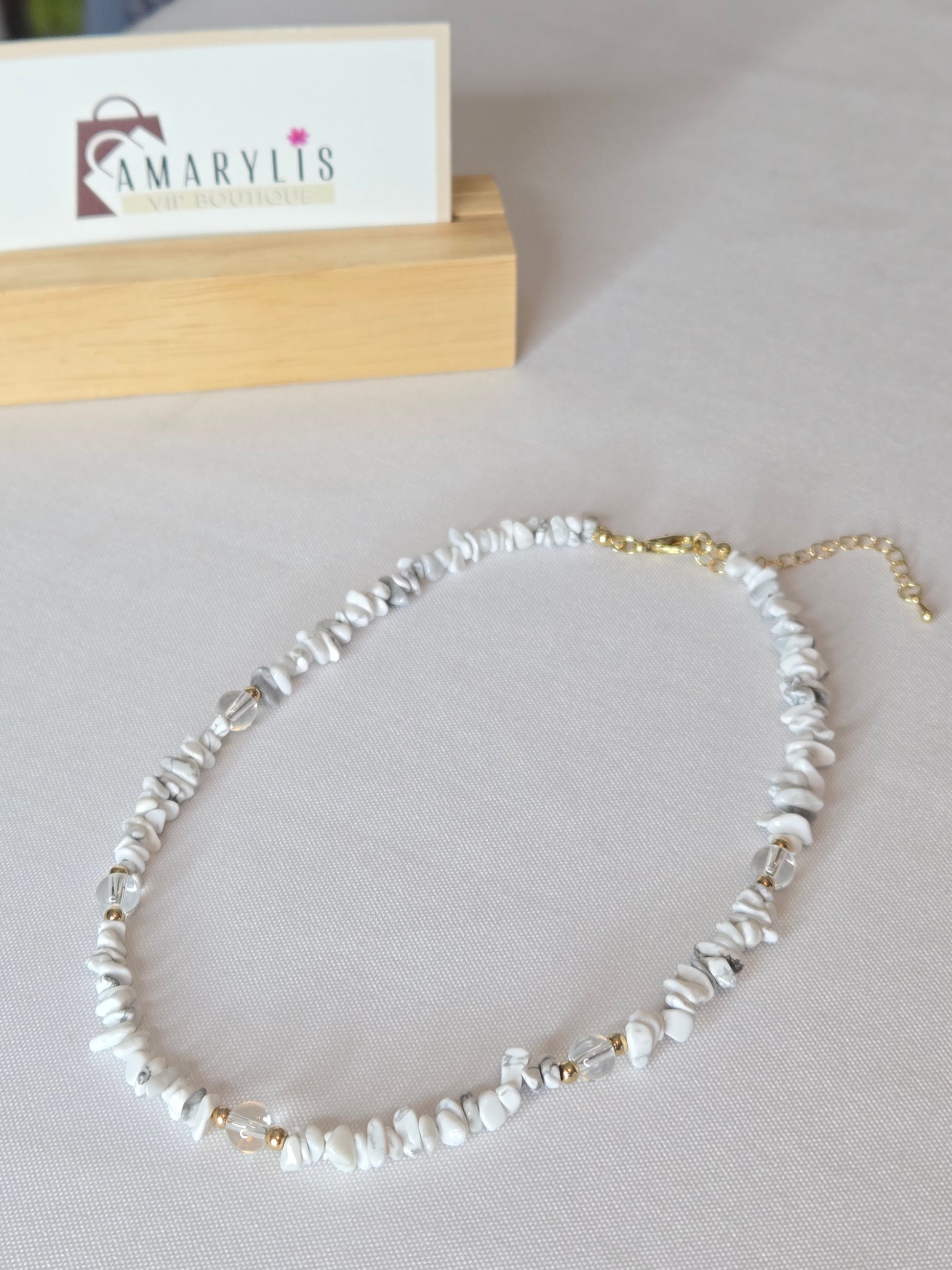 Elevate your everyday style with this beautiful pebble stone beaded necklace in soft marble-inspired shades of gray and white. Its timeless and versatile design makes it easy to pair with both casual and dressy looks. 