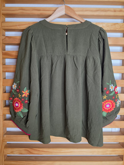 Women's boho blouse with embroidered sleeves and contrasting zigzag trim