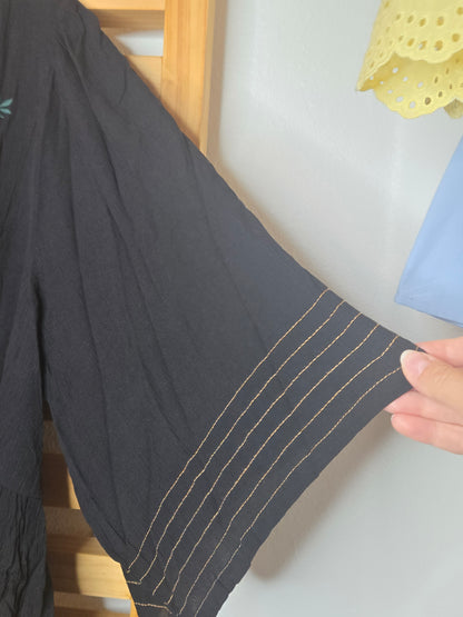 boho style blouse, black boho blouse, embroidered black blouse, tassel detail top, bohemian black top, lightweight boho blouse, half wing sleeve blouse, crinkle fabric blouse, floral embroidered top, boho chic outfit