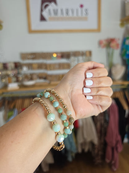 Set of mint green faceted stone stretch bracelets with gold-tone beads