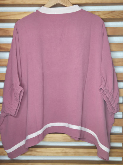 Women's dusty rose embroidered blouse featuring floral embroidery, contrast striped rib trim, short sleeves, and a relaxed fit.