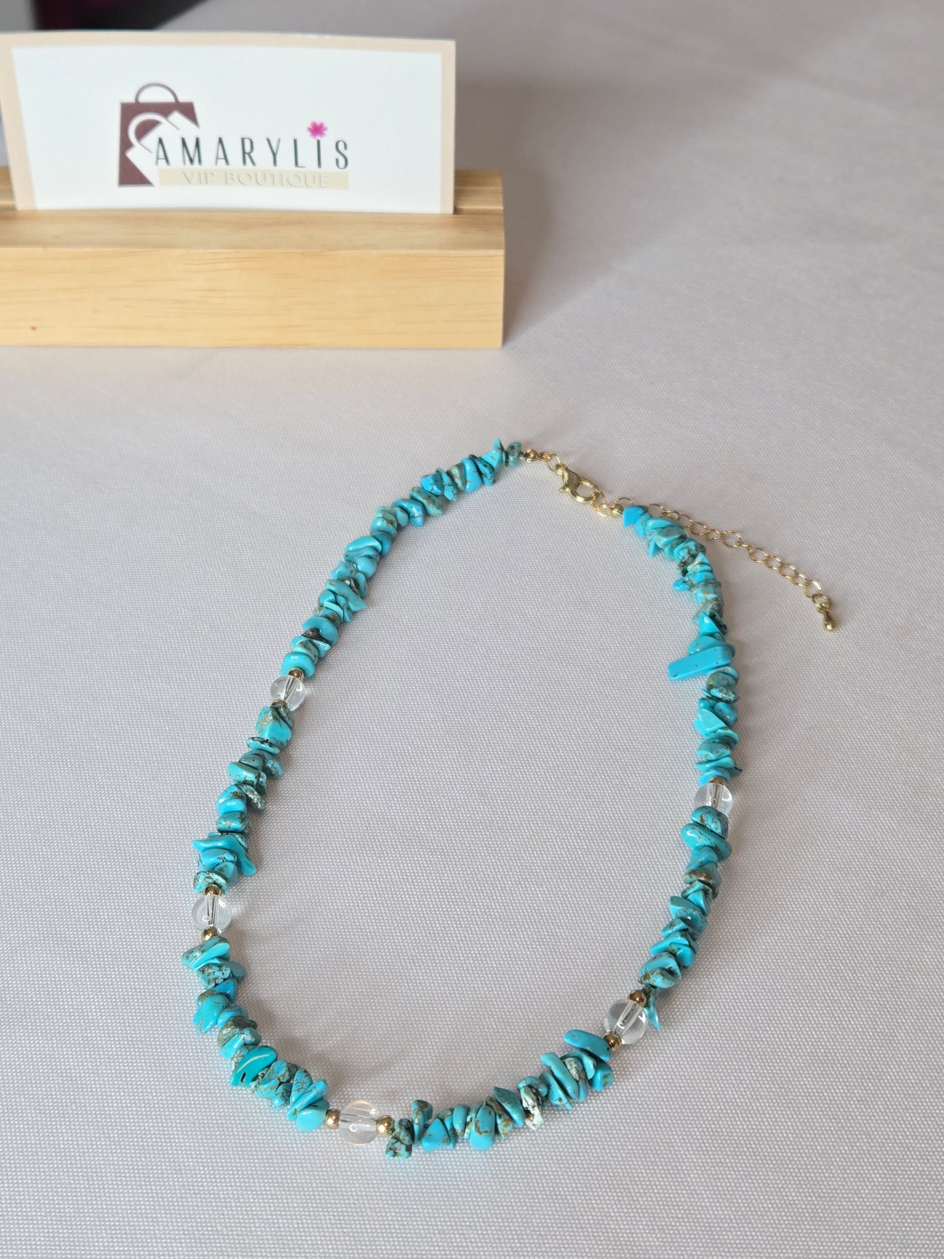 beautiful turquoise pebble stone beaded necklace. Designed to complement both everyday outfits and dressier ensembles, its timeless silhouette adds a subtle pop of color and natural elegance.