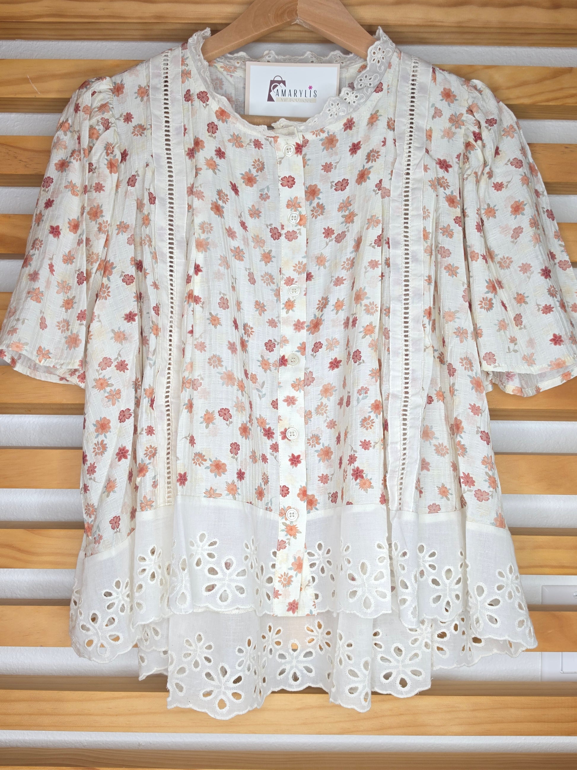 Floral print blouse with lace trim, flutter sleeves, and button-front closure