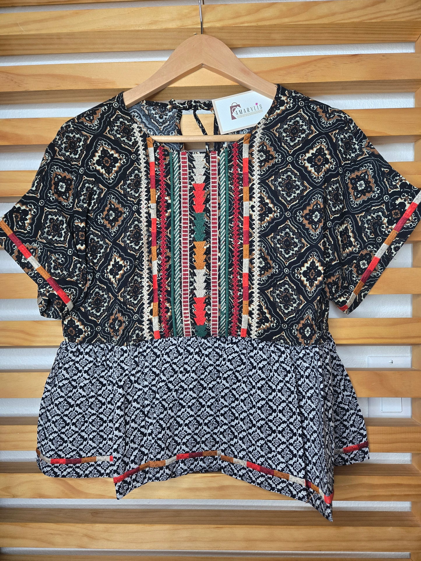 This piece is perfect for lovers of boho embroidered tops, mixed print blouses, and romantic bohemian clothing. A versatile short sleeve boho top designed for women who appreciate feminine, effortless style.