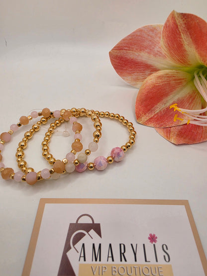 Set of pinkfaceted stone stretch bracelets with gold-tone beads