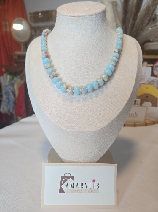 Semi-precious gemstone necklace featuring smooth sky-blue rondelle beads with natural brown matrix accents and delicate spacer beads.