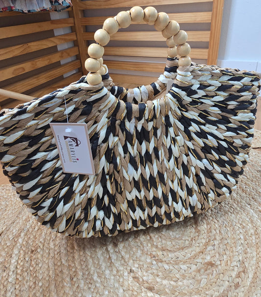 Straw crescent tote bag with round handles and inner lining with drawstring closure