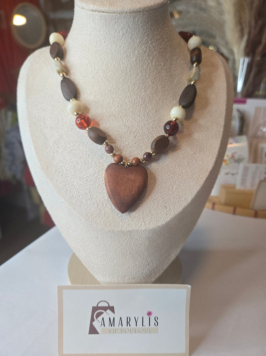 Wooden bead necklace featuring a heart-shaped pendant with a feminine and bohemian-inspired design.