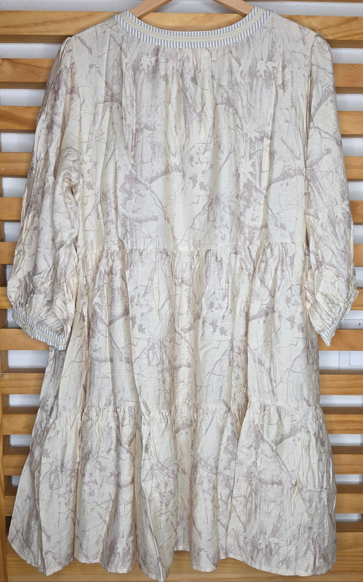 Women's boho camouflage print tiered dress with puff sleeves, side pockets and tassel tie neckline